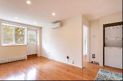 "BRIGHT TWO BEDROOM CONDO IN REGO PARK"