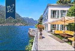 Wonderful waterfront villa by Lake Como with garden, infinity pool and dock with custom-ma