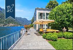 Wonderful waterfront villa by Lake Como with garden, infinity pool and dock with custom-ma