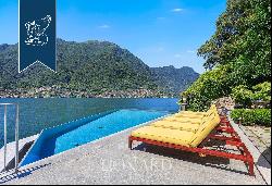 Wonderful waterfront villa by Lake Como with garden, infinity pool and dock with custom-ma