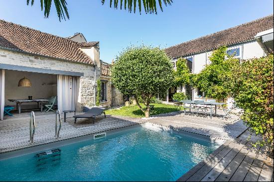 An entirely renovated farmhouse in a village