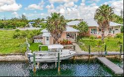 Beautiful Canal Front Home in Fortune Bay - MLS 58479