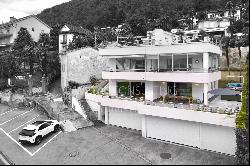 Exclusive apartment with large terrace, jacuzzi & partial lake view for sale in Locarno-M