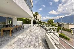 Exclusive apartment with large terrace, jacuzzi & partial lake view for sale in Locarno-M