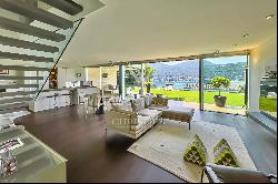 Lugano-Figino: sunny duplex apartment with enchanting view of Lake Lugano & private garde