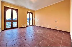 Lugano-Ruvigliana: elegant apartment with breathtaking lake views, pool & garden for sale