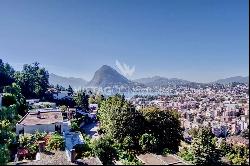 Lugano-Viganello: modern penthouse apartment with large covered terrace & lake view for s