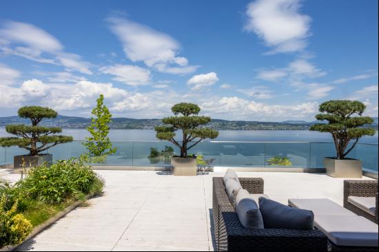 Exclusive penthouse maisonette with lake view in Bach