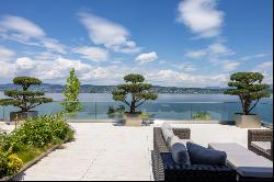 Exclusive penthouse maisonette with lake view in Bach