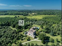 Enhanced fortified domaine featuring a secondary residence, a luxurious pool, and sprawli