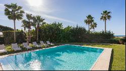 Luxurious and spacious front line beach villa in Las Chapas, Marbella East