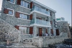 For sale seafront stone house with three apartments in Krasici