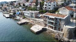 For sale seafront stone house with three apartments in Krasici