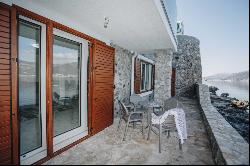 For sale seafront stone house with three apartments in Krasici