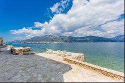 For sale seafront stone house with three apartments in Krasici