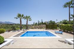 Andalusian style villa next to La Cala golf club