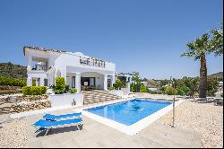 Andalusian style villa next to La Cala golf club