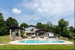 Modern villa surrounded by greenery