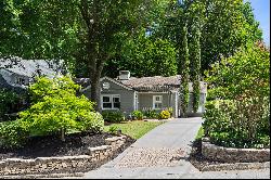 Charming Cottage on Generous Almost Half-Acre in Sought-After Morningside