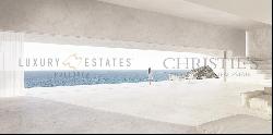 Large lot with a building license for an ultramodern villa in Cala Murada's first sea line