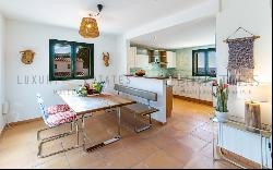 Penthouse in Sant Telm with a garden and roof terrace near the beach