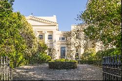 An exceptionally rare double fronted John Nash villa with a self contained Mews