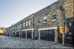 An exceptionally rare double fronted John Nash villa with a self contained Mews