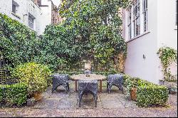 An exceptionally rare double fronted John Nash villa with a self contained Mews