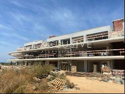 Buy luxury 3 Bedroom contemporary penthouse in Vilamoura with golf and ocean views