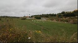 Well located plot with two ruins for sale near Salgados Golf in Algarve near Praia Grande