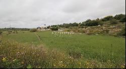 Well located plot with two ruins for sale near Salgados Golf in Algarve near Praia Grande