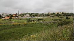 Well located plot with two ruins for sale near Salgados Golf in Algarve near Praia Grande