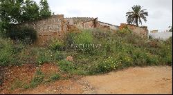 Well located plot with two ruins for sale near Salgados Golf in Algarve near Praia Grande