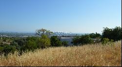 Well priced Plot near Loul&eacute; with ruin and seaviews for sale in Central Algarve