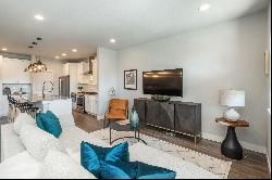  Impeccable urban townhome offers an impressive open floor plan