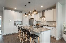  Impeccable urban townhome offers an impressive open floor plan