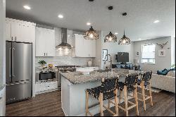  Impeccable urban townhome offers an impressive open floor plan