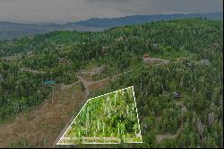 Serene 2-Acre Pine Meadow Ranch Homesite With Exceptional Surroundings