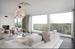 Exclusive property with a sunny elevated position and views over Baggensstaket.