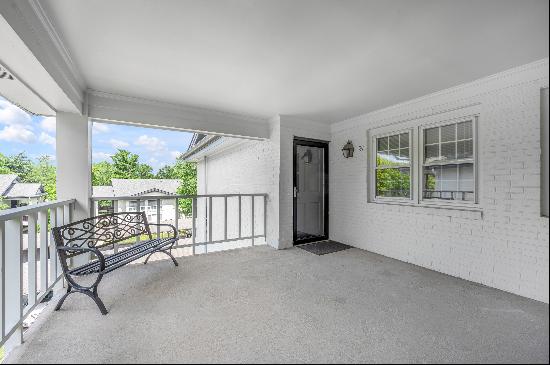 Move in ready two bedroom, two bathroom top floor condo at The Oaks! Convenientl