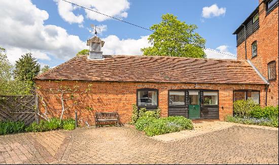 Unique home in the heart of this sought-after village.