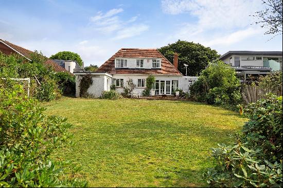 A splendid four bedroom detached property with plenty of character and delightful gardens,