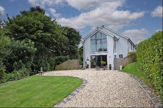 A beautifully designed, detached house, situated in a private setting in the heart of King