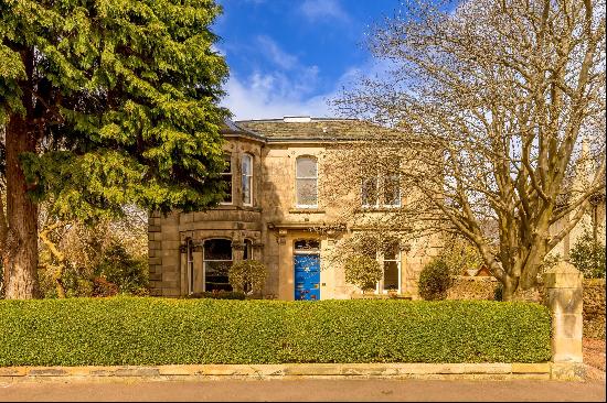 An ideal family home set in a beautiful garden, with parking and a garage.