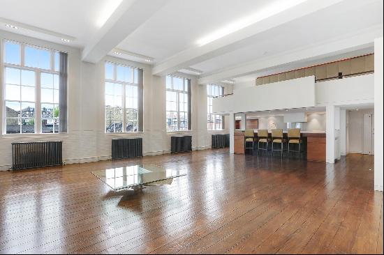 Exceptional four-bedroom duplex apartment in Battersea, housed within an exclusive village