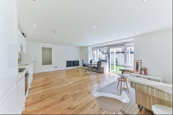 A 2 bedroom flat for sale on Buckland Crescent, NW3.