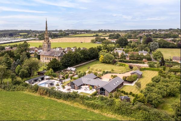 A unique and beautifully presented modern home on the edge of a historic Kent village with