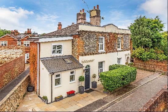 A wonderfully located home in a quiet and private position under half a mile to Guildford 