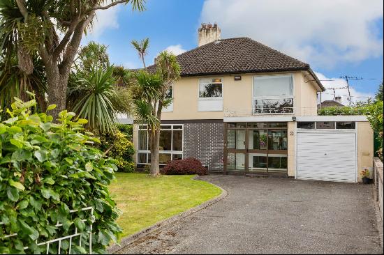 This detached 4-bedroom family residence is perfectly situated on approximately 0.