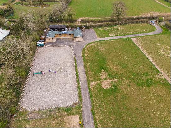 A lovely five-acre equestrian property in a rural location with a stable yard, manège and 